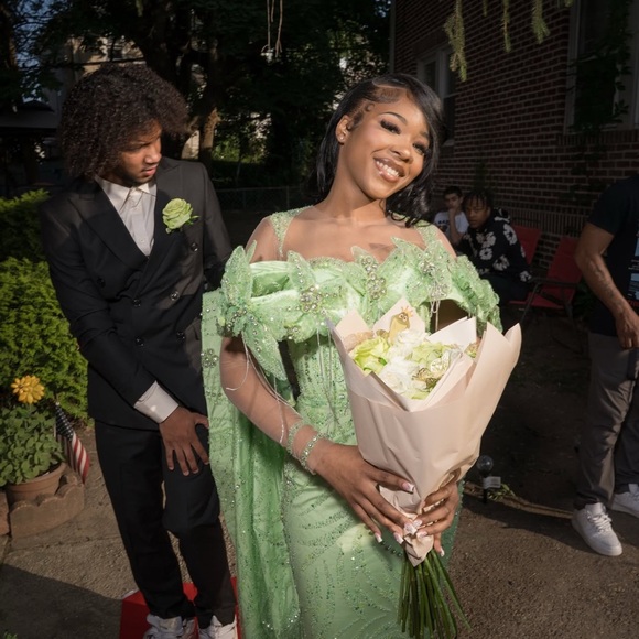 Elegant Green Gown with Floral Accents